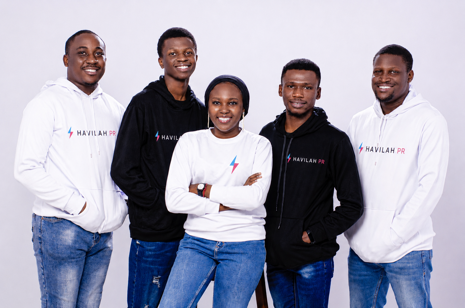 The Havilah PR team standing together in branded HavilahPR hoodies